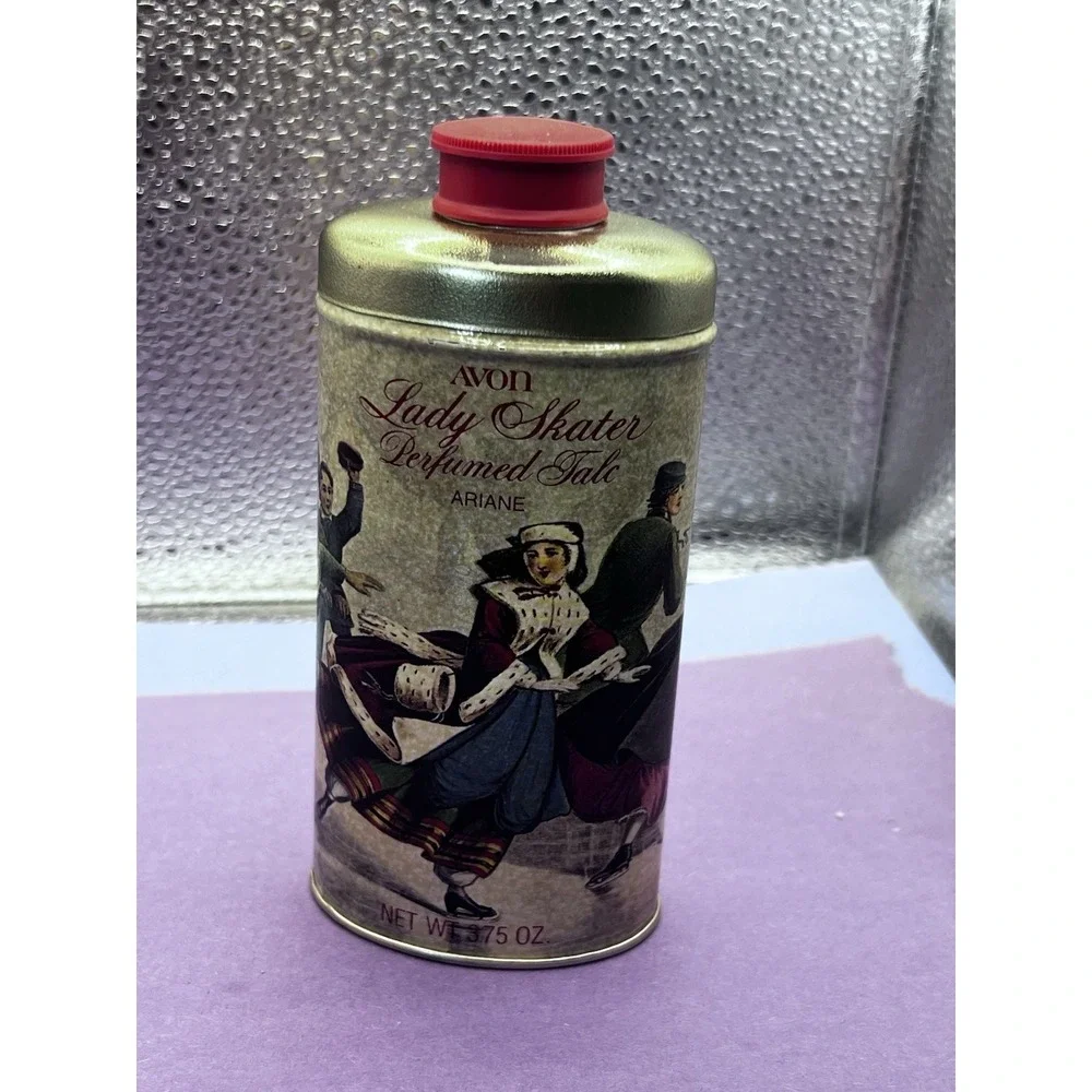 Vintage 1970's Avon perfumed Talc Tin In Ariane scent Bottle Lady Skater 3.75 Oz